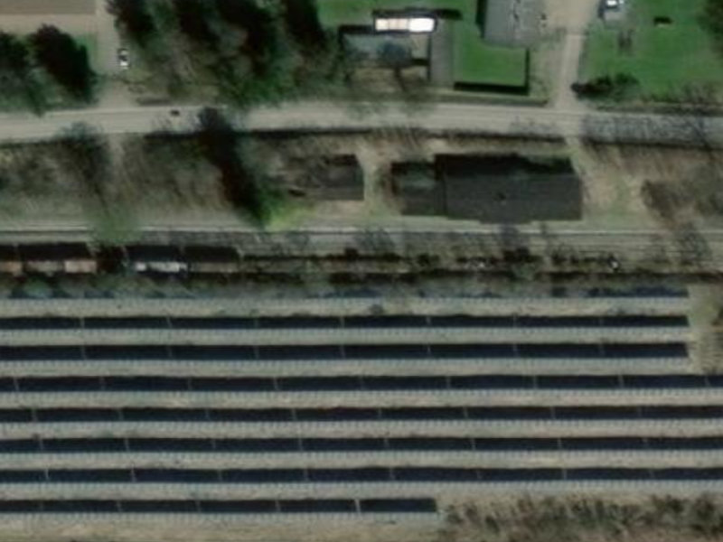 Tábor's Sun-Drenched Iron Siding