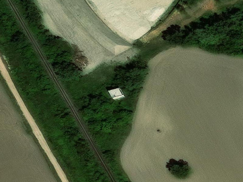 Hidden Rail-Side Concrete Sentry