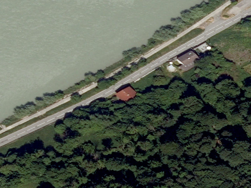 Crimson Roof on the Inn Riverbank
