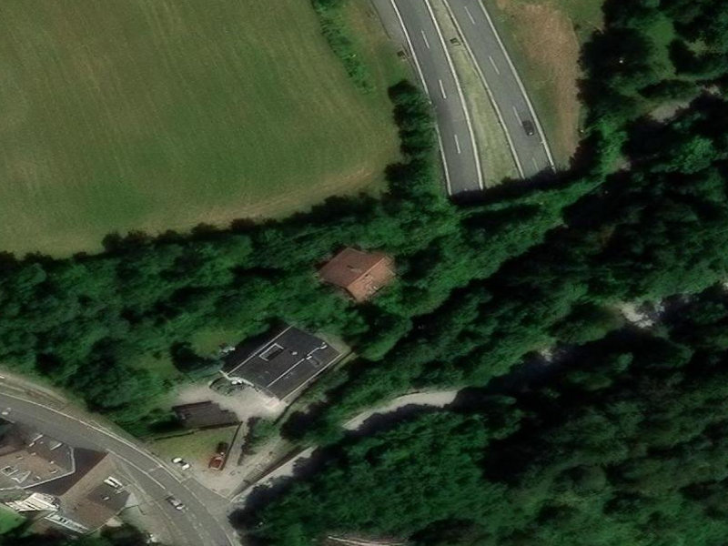 Red-Roofed Shadows at Schwaz Edge