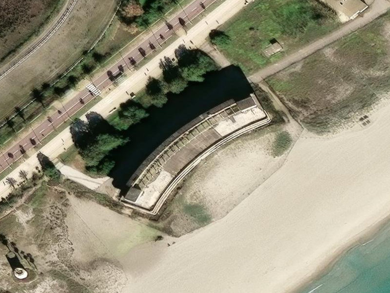 Viale Poetto's Silent Sentinel: The Abandoned Crypt of Cagliari